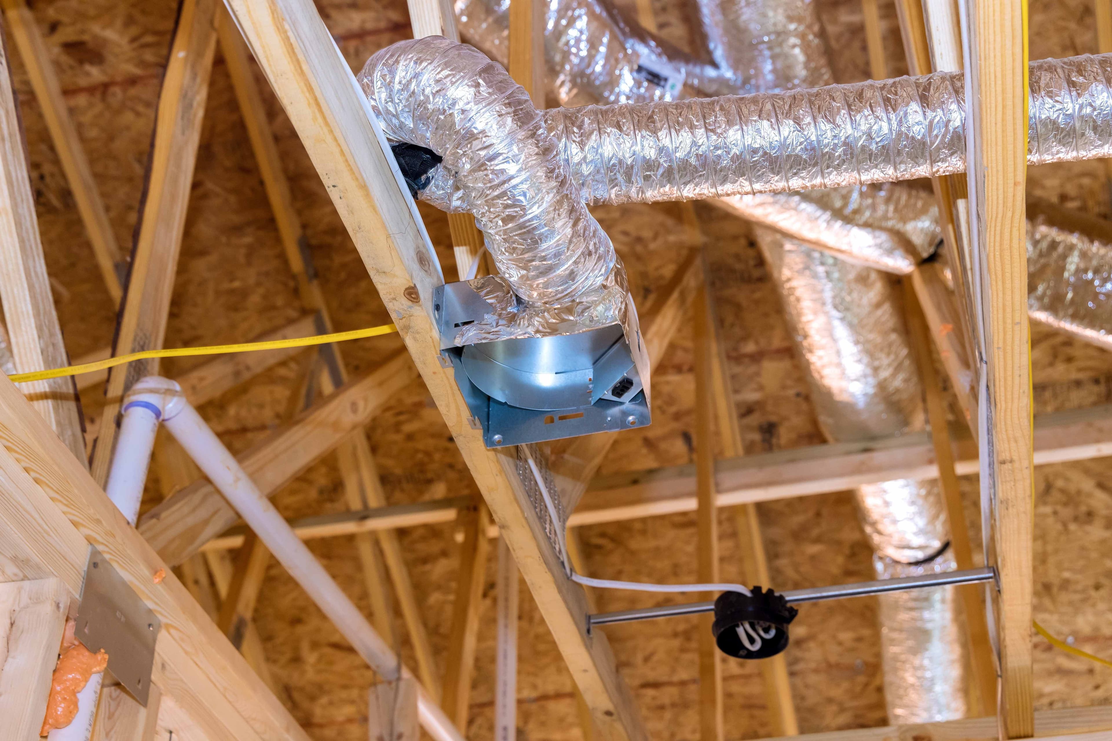 Flexible attic duct connected to a vent box