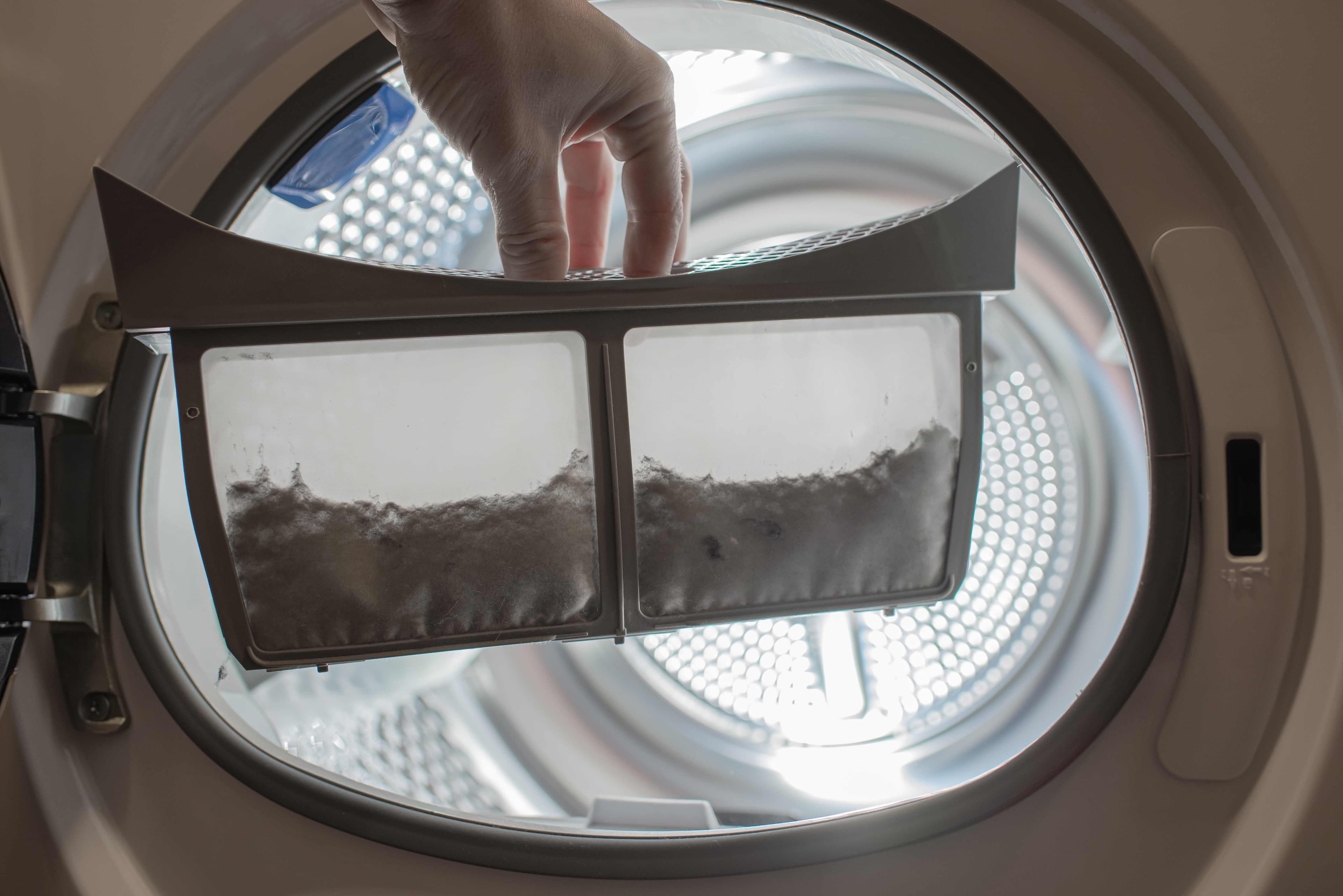 Lint removed from a clogged dryer lint filter