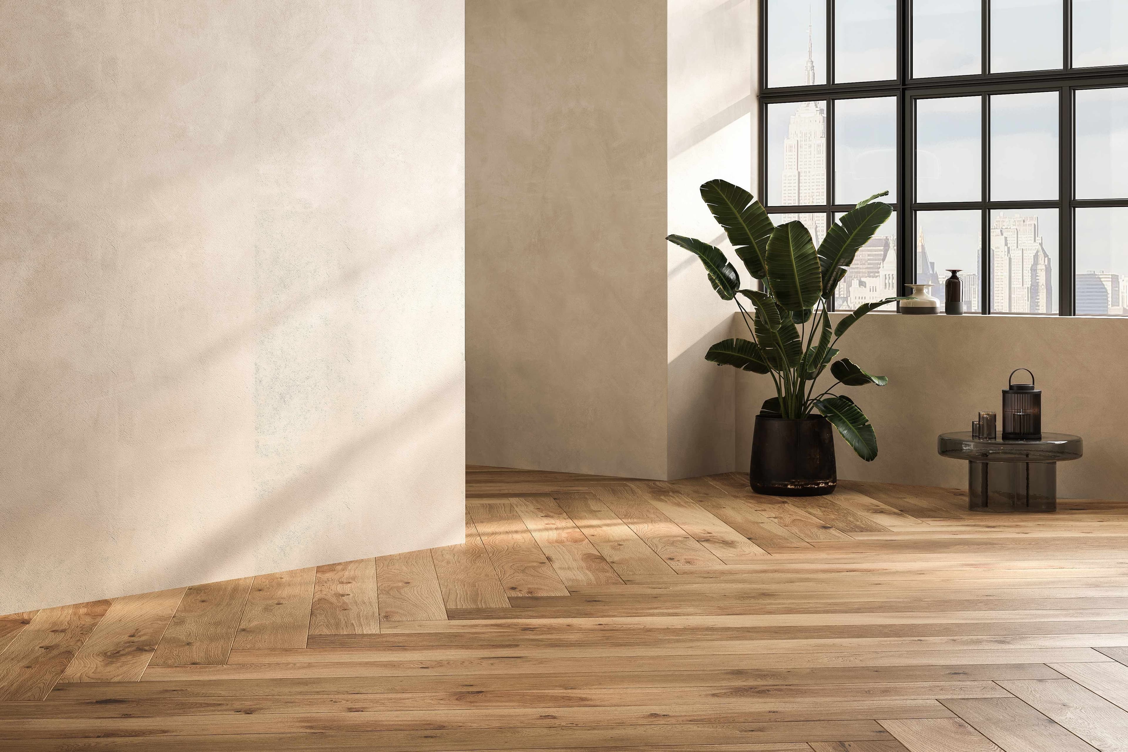 Finished wide-plank wood floor in a bright room